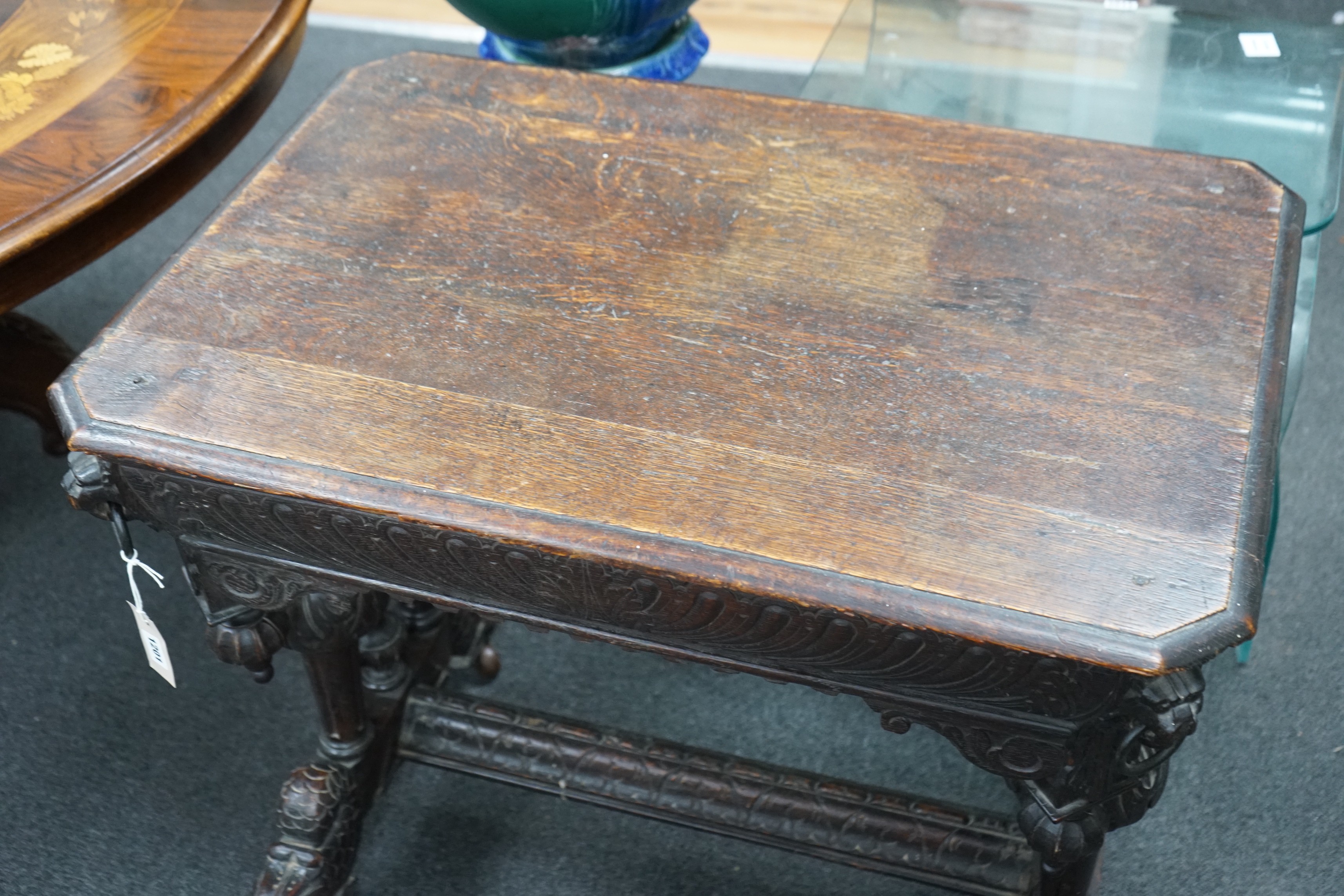 A 19th century Flemish carved oak centre table, width 82cm, depth 57cm, height 72cm